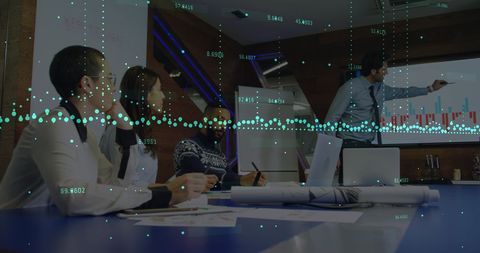 diverse team engaged in data-driven business presentation - Download Free Stock Images Pikwizard.com