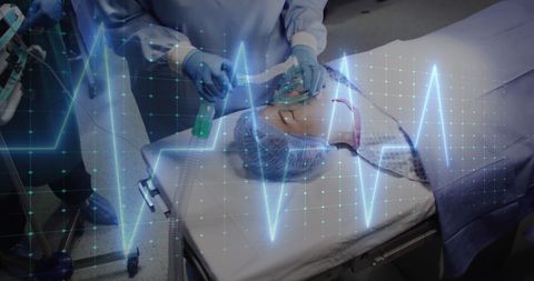 Surgeons Operating with Cardiac Monitoring Technology