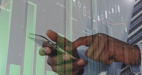 Businessman analyzing trading data on smartphone