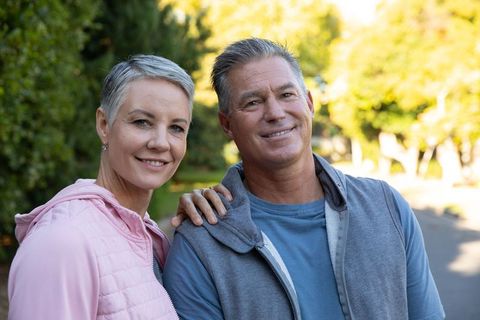 Happy Senior Couple in Casual Wear Enjoying Outdoors