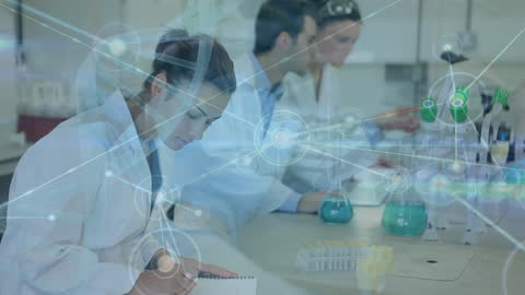 Diverse Scientists Analyzing Data in Advanced Laboratory Setting