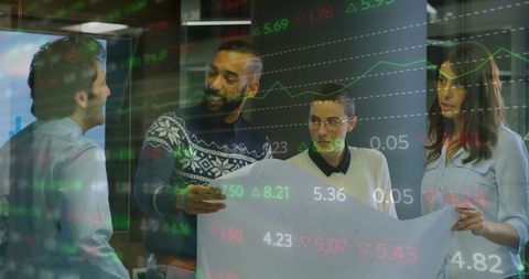 Business Team Discussing Stock Market Data Projections in Office