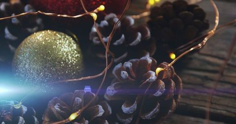 Holiday Festivity with Glittery Baubles and Pinecones