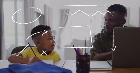 Father and son collaborating with creative visual disconnects