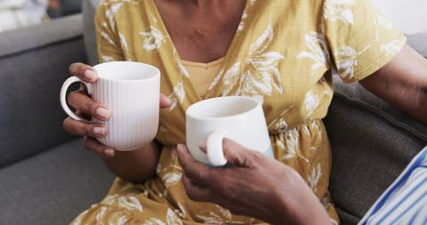 Senior Women Enjoying Coffee and Friendship at Home