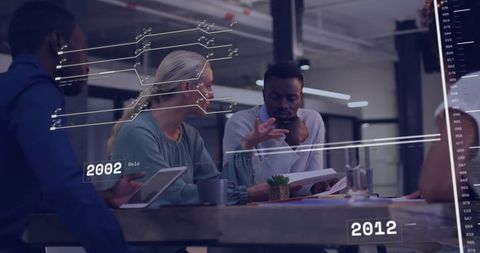 Team Discussing After Analyzing Futuristic Data Visualization in Office