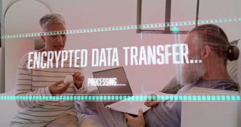 Older couple discussing medication while laptop displaying encrypted data transfer overlay