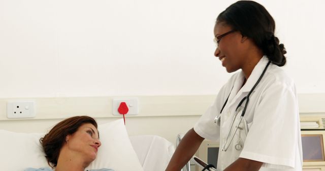 Compassionate Nurse Caring for Patient in Hospital Room - Download Free Stock Images Pikwizard.com