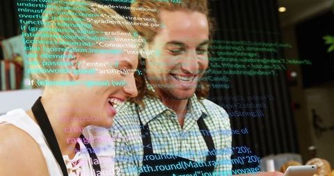 Culinary Professionals Reviewing Code in Modern Digital Kitchen