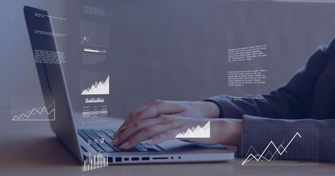 Businesswoman Analyzing Trend Data with Laptop and Graphs