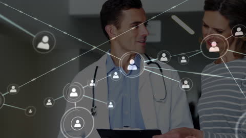 Medical Professional Analyzing Digital Network Connections with Patient