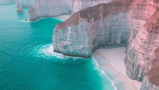 Majestic limestone cliffs by turquoise sea