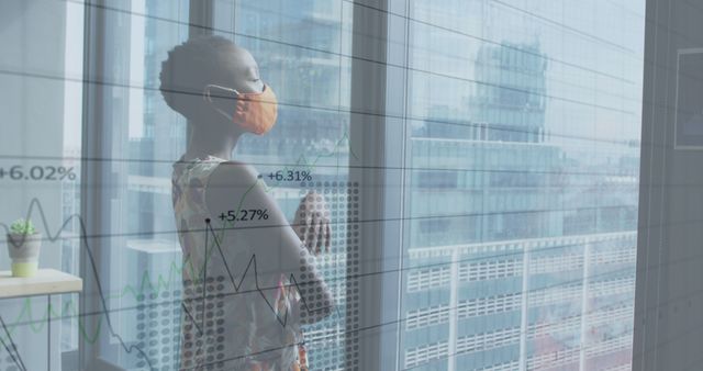 Businesswoman with Face Mask Analyzing Financial Data - Download Free Stock Images Pikwizard.com