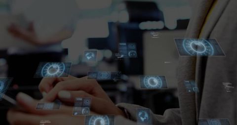 Businesswoman Tapping Tablet Controlling Holographic Interface in Collaborative Office