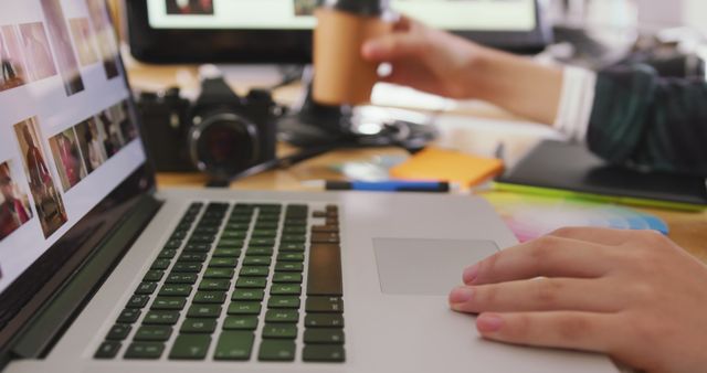 Graphic Designer Editing Photos on Laptop with Camera and Coffee Cup on Desk - Download Free Stock Images Pikwizard.com