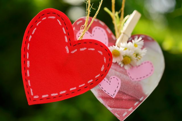 Close up of Heart shaped hanging decorations. love and decoration concept