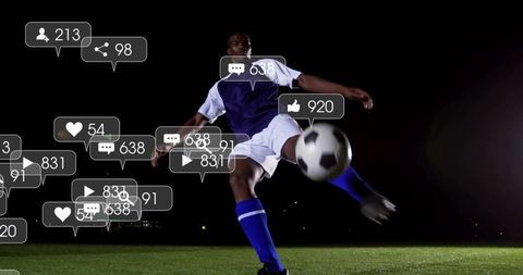 Soccer Player Kicking Ball with Social Media Engagement at Night