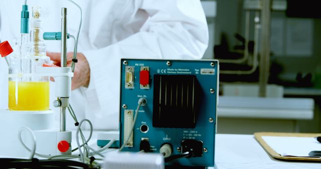 Scientist Conducting Experiment with Advanced Laboratory Equipment - Download Free Stock Images Pikwizard.com