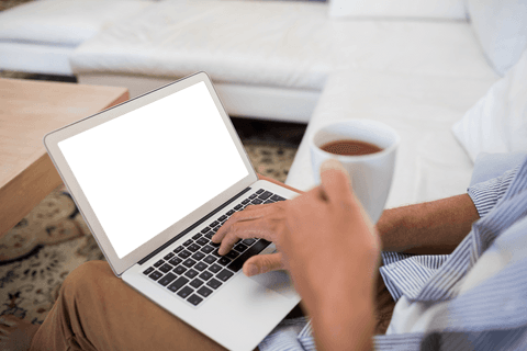 Person Relaxing with Transparent Laptop and Coffee - Download Free Stock Videos Pikwizard.com