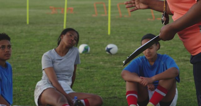 Coach Giving Instructions to Youth Soccer Players on Field - Download Free Stock Images Pikwizard.com