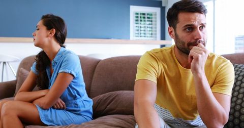 Frustrated Couple Avoiding Eye Contact in Living Room - Download Free Stock Images Pikwizard.com