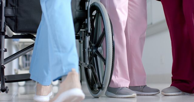 Healthcare Professionals Assisting Patient in Wheelchair - Download Free Stock Images Pikwizard.com