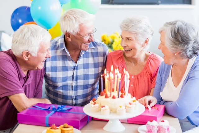 Seniors celebrating a birthday in a retirement home