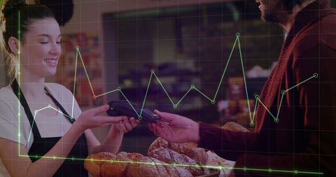 Young Woman Seller Using Credit Card Reader in Bakery with Data Overlay