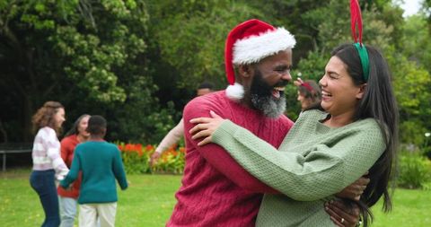 Outdoor Holiday Celebration with Family in Festive Outfits