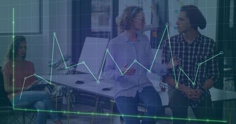 Modern Technology Team Discussion with Digital Graph Overlay in Office