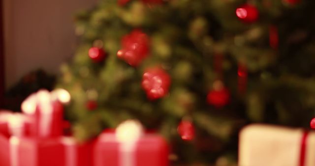 Christmas Tree with Blurry Decorated Background and Red Gift Boxes - Download Free Stock Images Pikwizard.com