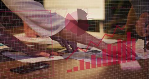 collaborative business team analyzing financial data with graph overlays - Download Free Stock Images Pikwizard.com