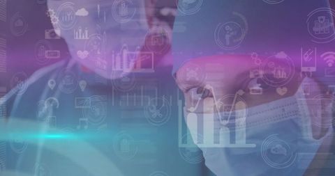 Surgeons Analyzing Data in High-Tech Medical Environment