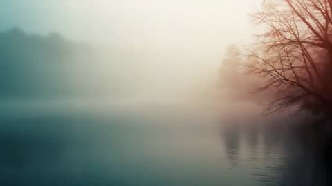 Tranquil Dawn Lake Scene with Misty Reflections