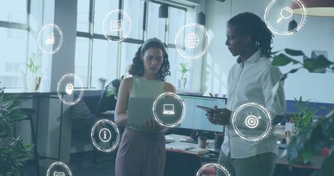 Business Team Discussing Digital Innovations in Modern Office