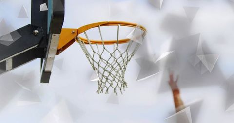 Outdoor Basketball Hoop with Hand Reaching Towards Net, Dynamic Motion