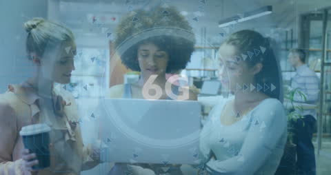 Diverse Team Discussing 6G Technology in Modern Office