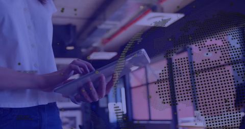 Businesswoman Engages with Global Digital Strategy Using Tablet