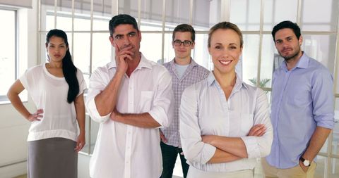 Confident Team of Designers in Office Setting - Download Free Stock Images Pikwizard.com