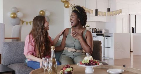Joyful Celebration with Diverse Couple at Birthday Party