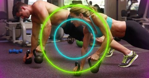 Performing kettlebell plank rows duo building core strength and functional fitness