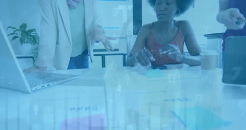 Business Team Analyzing Financial Data in Office Environment