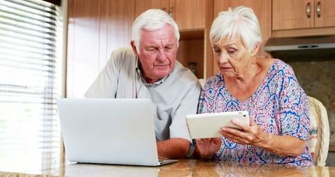 Senior Couple Using Technology Together at Home - Download Free Stock Images Pikwizard.com