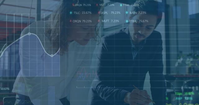 Colleagues Analyzing Financial Data on Transparent Screen in Modern Office - Download Free Stock Images Pikwizard.com
