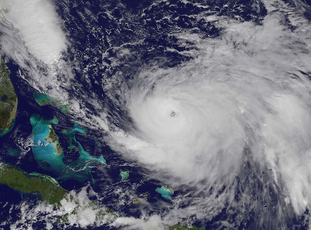 Satellite imagery capturing Hurricane Joaquin over the Bahamas on October 3, 2015. Image useful for weather-related reports, educational material, climate change studies, and environmental awareness.