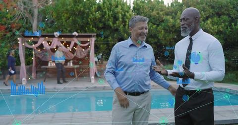 Two professionals networking poolside with ar data overlays during evening event