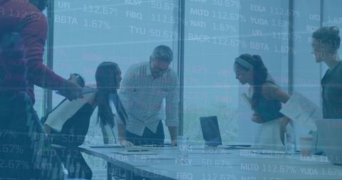 financial data overlay on diverse corporate team discussion in office - Download Free Stock Images Pikwizard.com