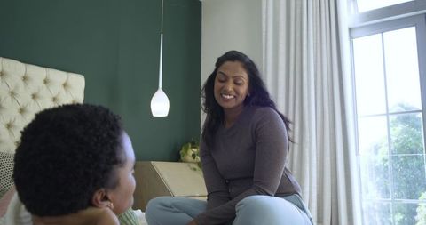 Mother and Teen Daughter Bonding at Home