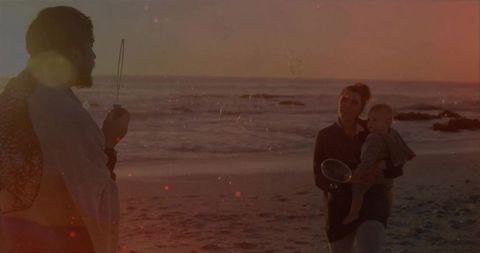 Family enjoying bubble play at scenic sunset beach