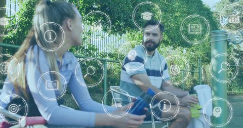 Diverse Friends Discussing Post-Workout with Digital Infographic Overlay